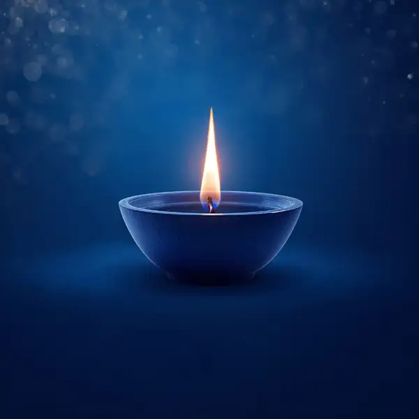 diya-glowing-on-a-blue-background