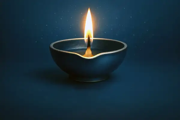 elegant-blue-diya-glowing-peacefully