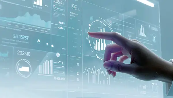 hand-touching-a-futuristic-data-dashboard